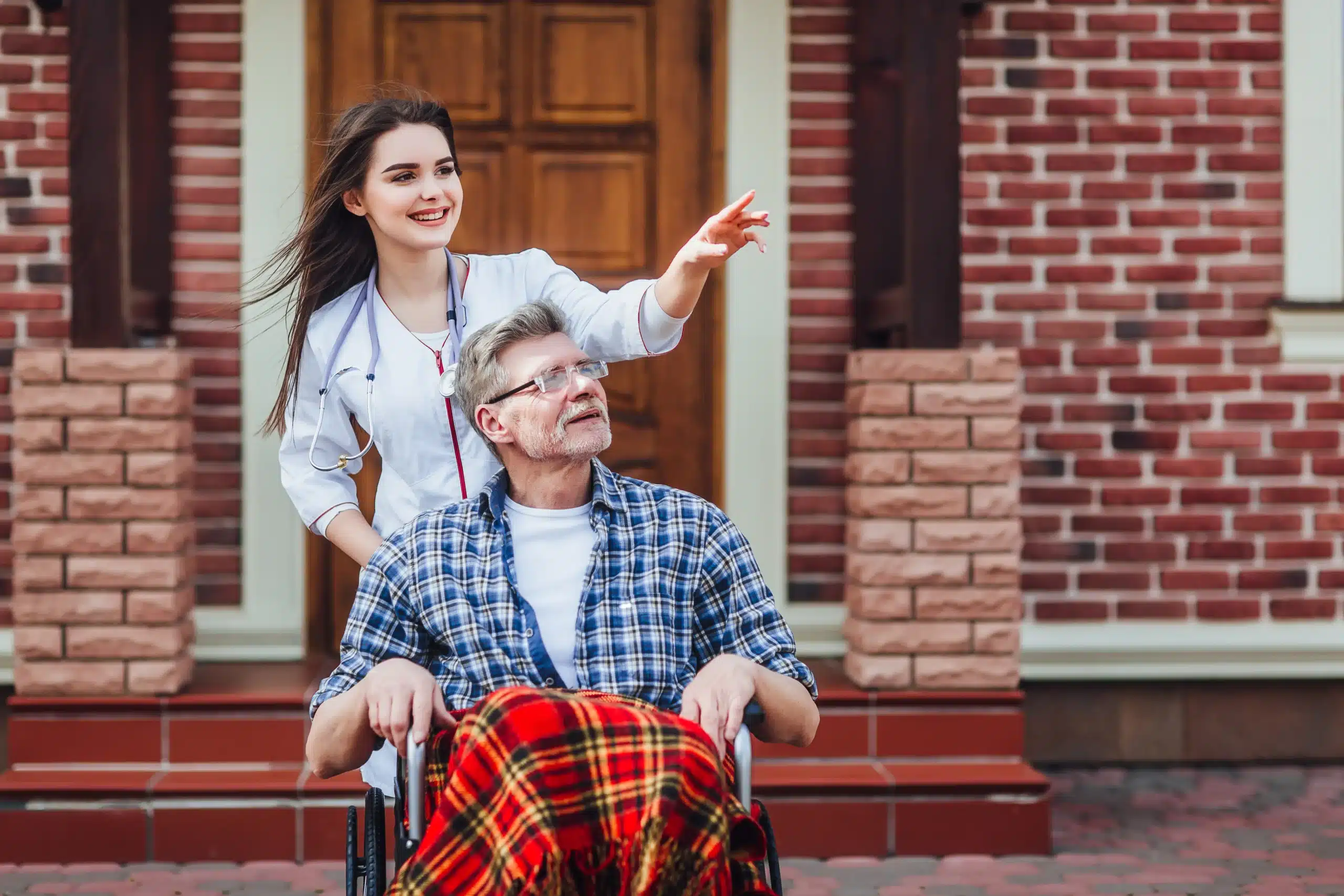 contented-senior-patient-with-kind-doctor-nursing-home-time-together